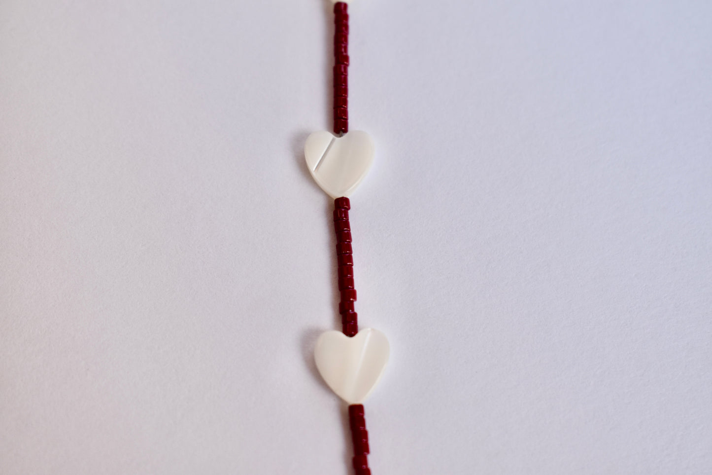 Pearl heart with maroon