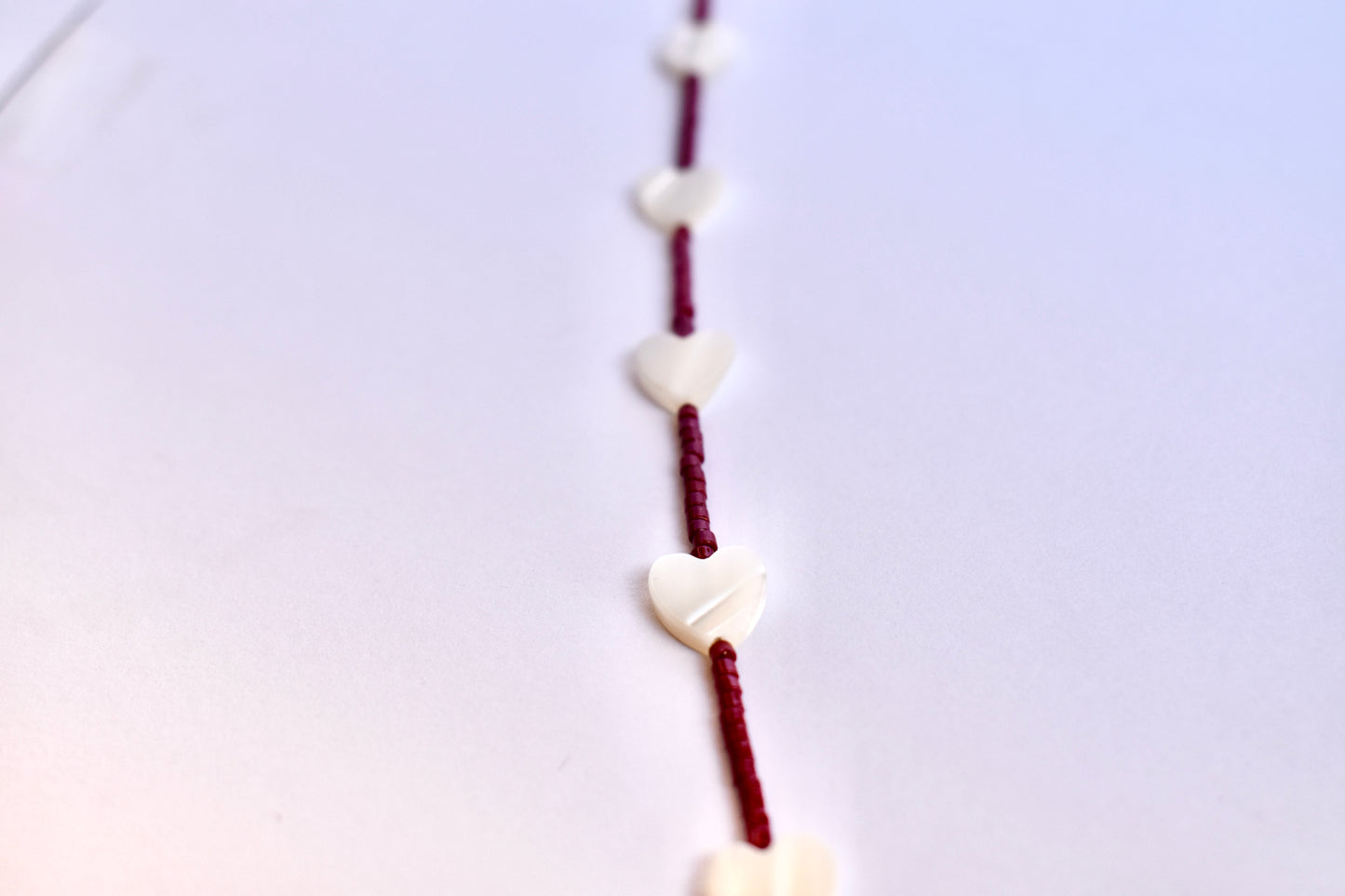Pearl heart with maroon